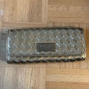 Michael Kors Gold Leather clutch